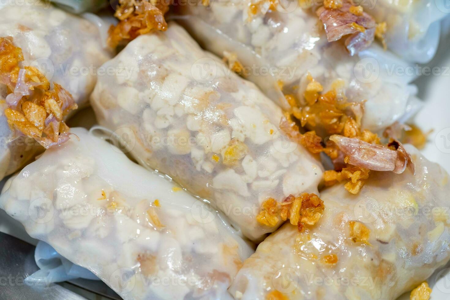 Noodle rice wrap with stuffed tofu and bean sliced fried in plastic box photo