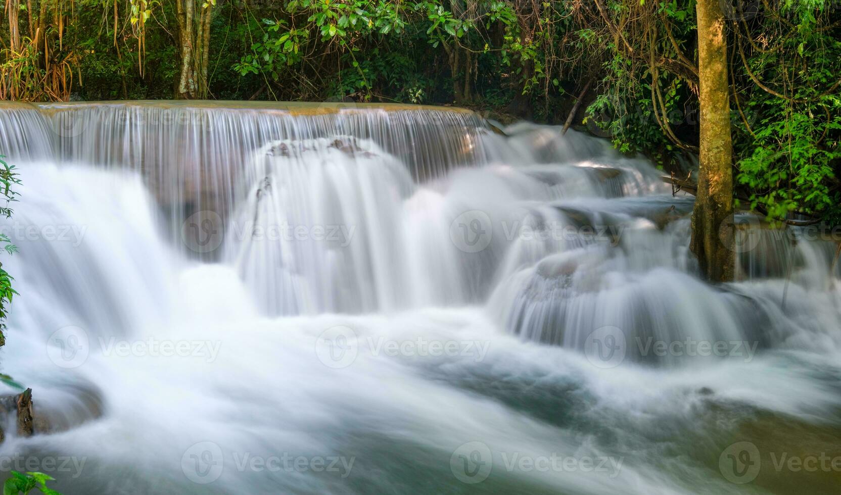 Beautiful Huay Mae Khamin waterfall in tropical rainforest at Srinakarin national park photo