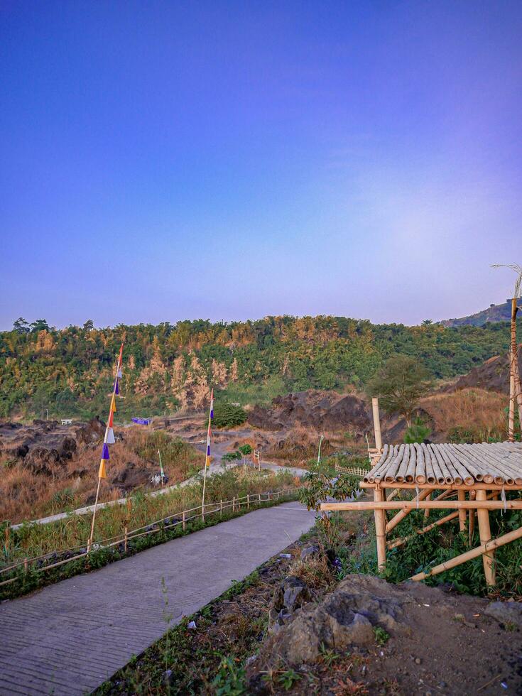 mountain view morning of bamboo stage view point with colorful of yellow sun light in the sky background, photo