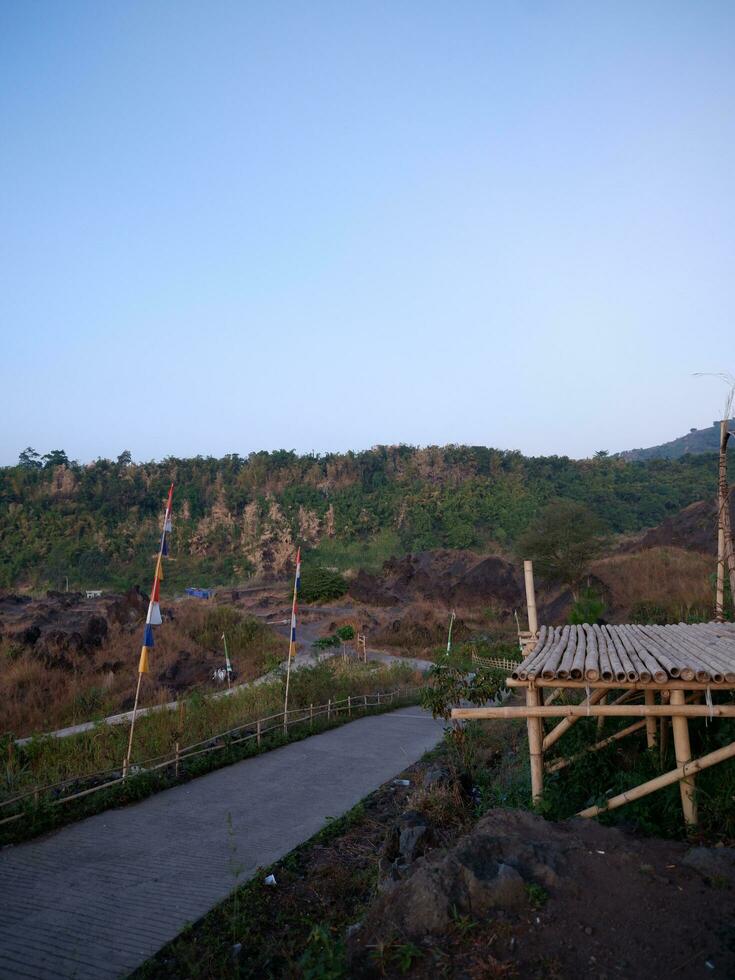 mountain view morning of bamboo stage view point with colorful of yellow sun light in the sky background, photo