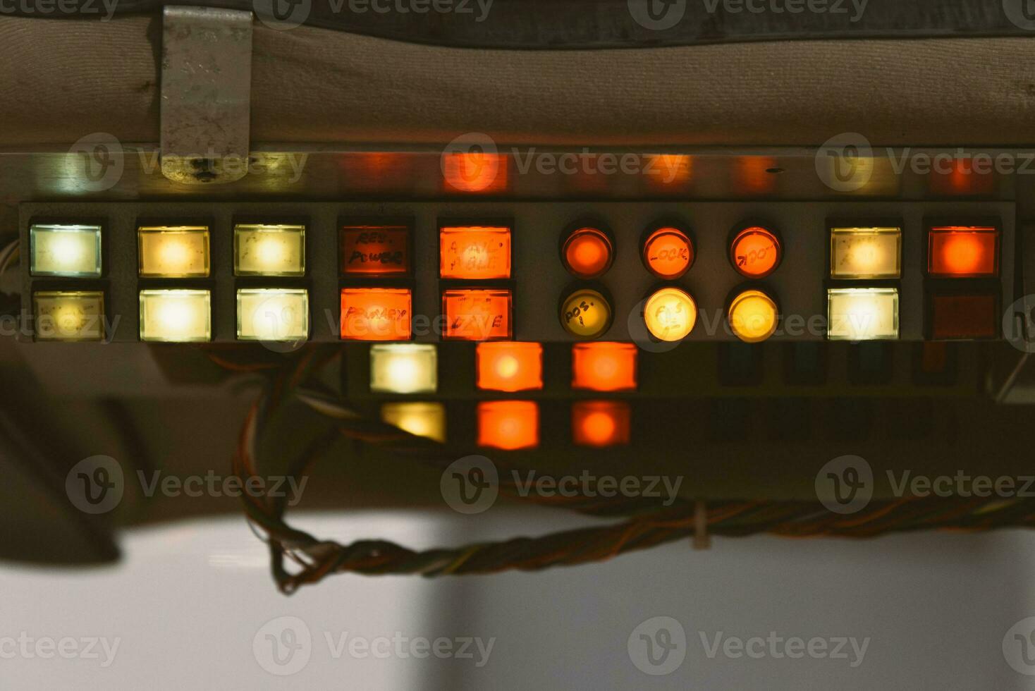 Old school panel with red, yellow and green buttons photo