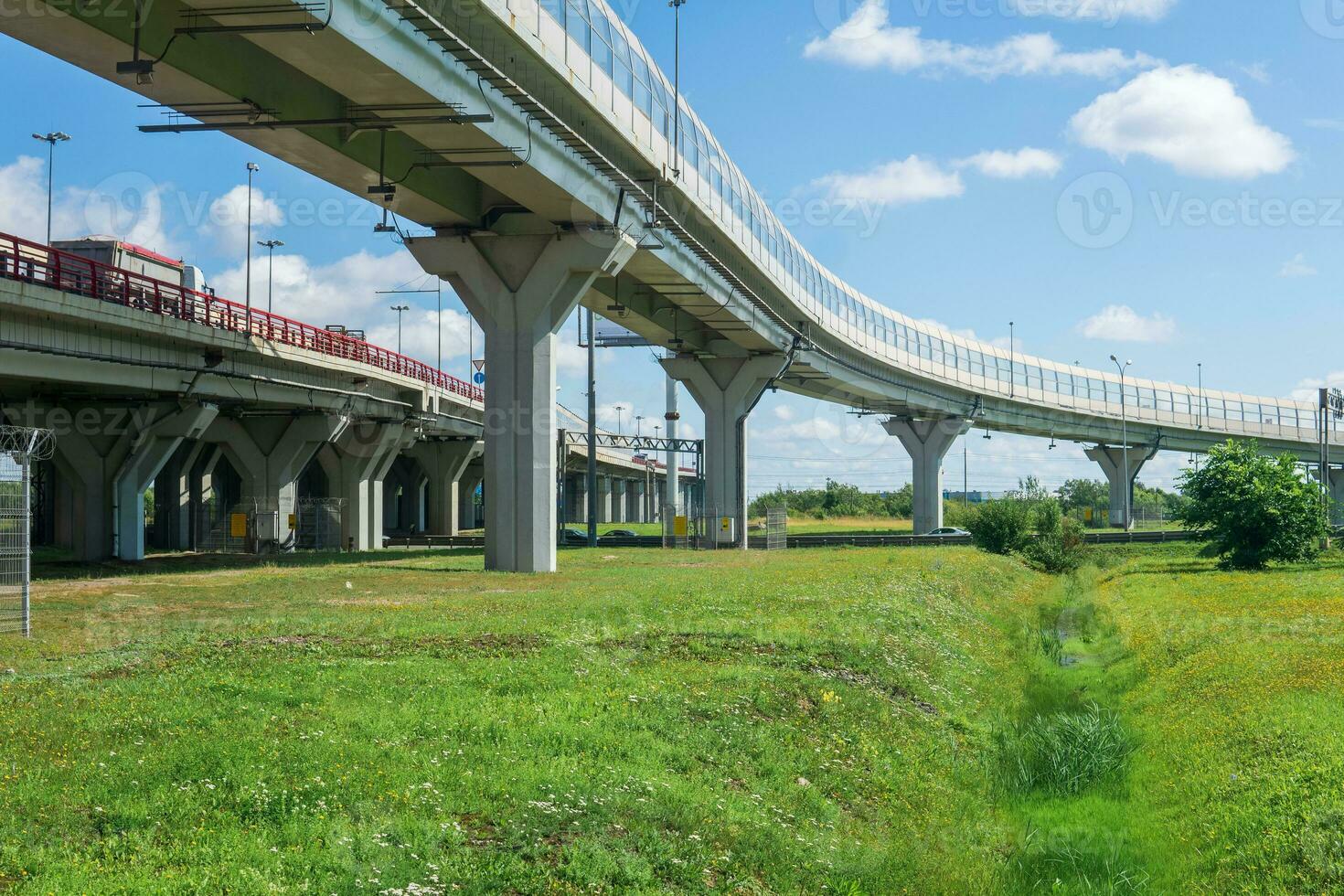 road junction on overpasses above the meadow photo