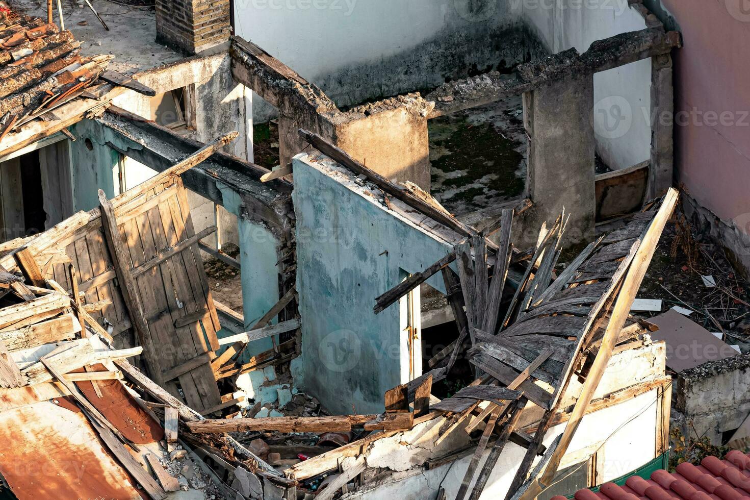 quarter of dilapidated rural houses, top view photo