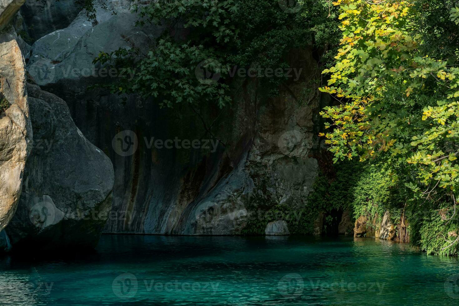 rocky canyon with blue water in Goynuk, Turkey photo