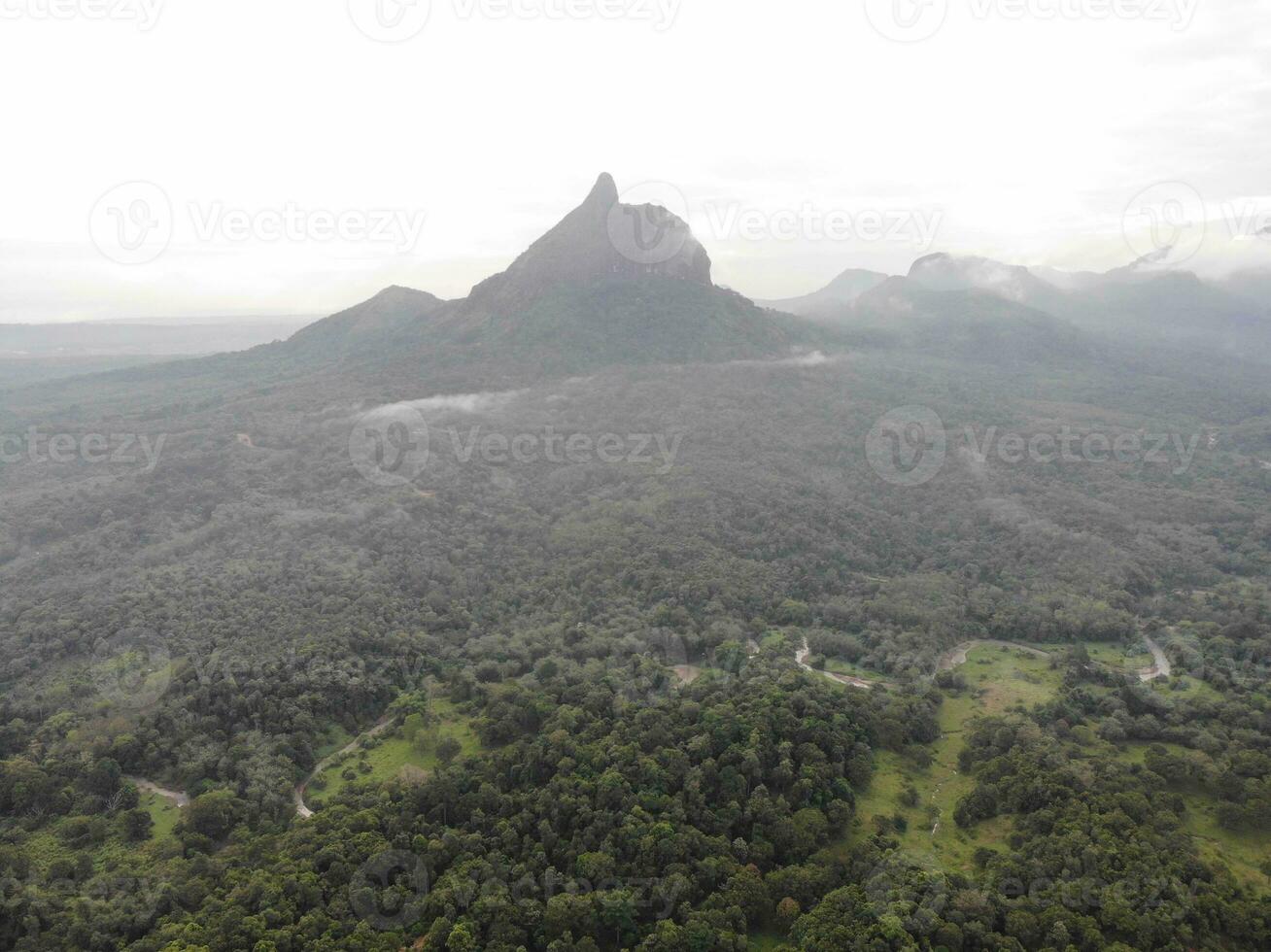 a view of the mountains from a hillside. Serelo Hill is located in Perangai Village, Lahat regency, and it becomes one of popular landmark in Lahat regency. photo