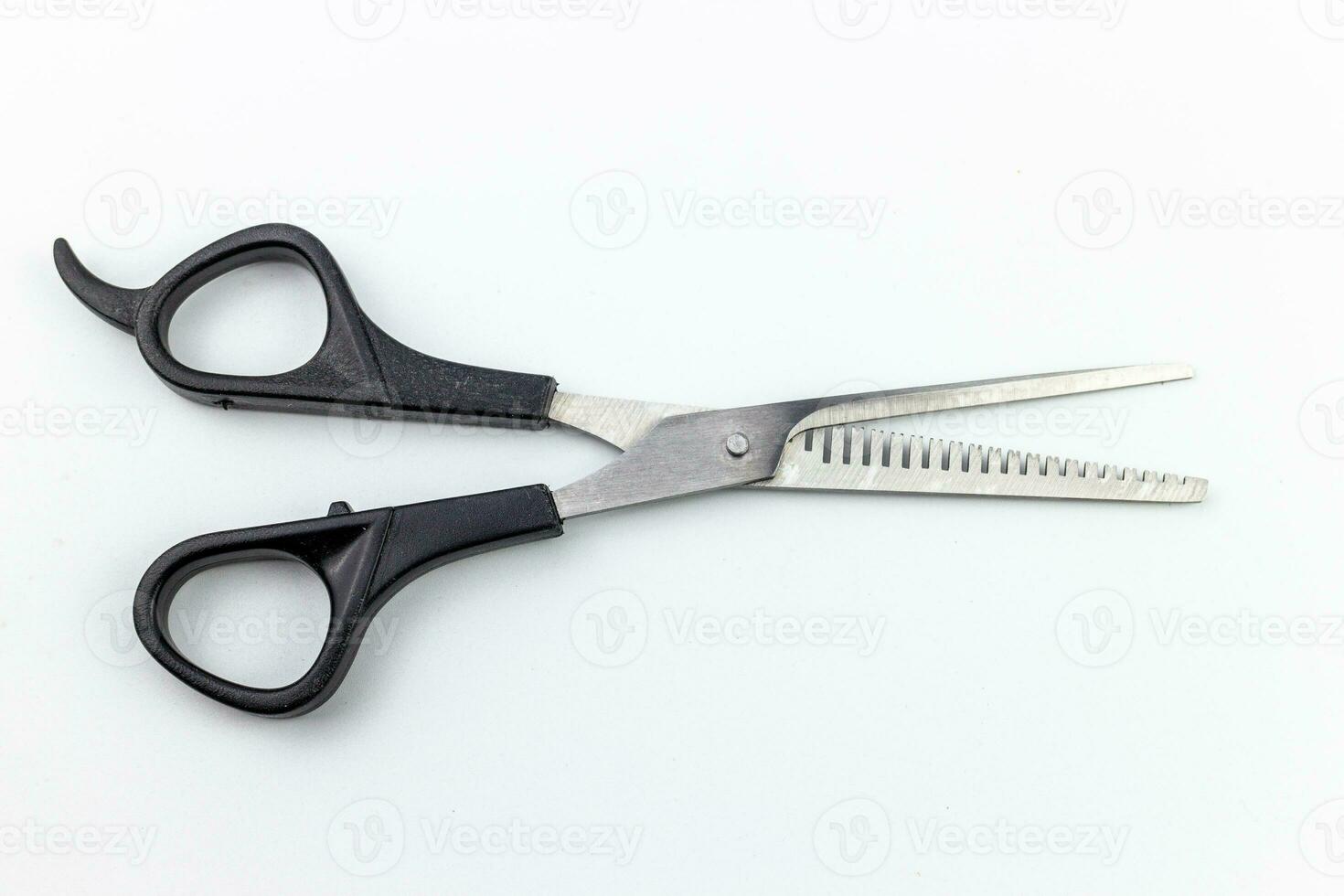 Scissors isolated on white background, clipping path included. Close up. photo