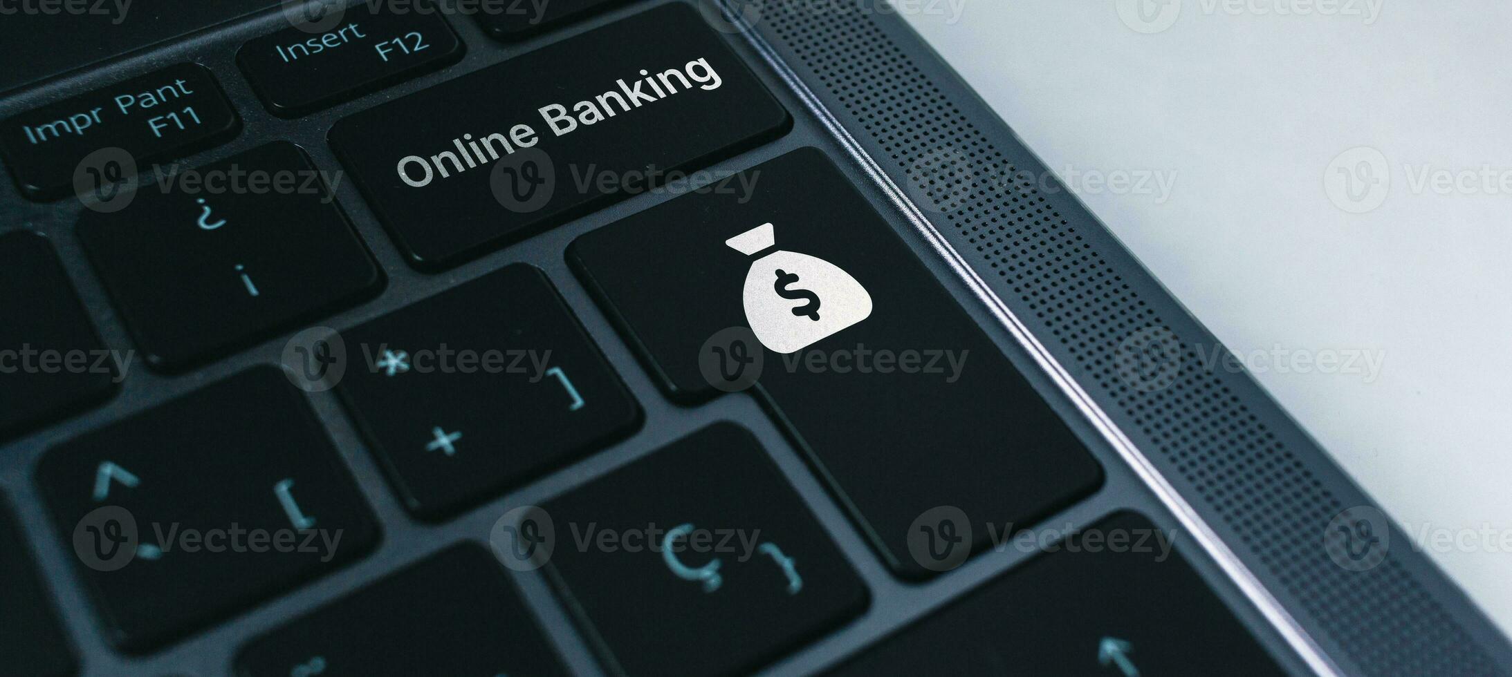 Laptop keyboard with online banking concept on buttons. Business app. Shopping online. Digital payments. photo