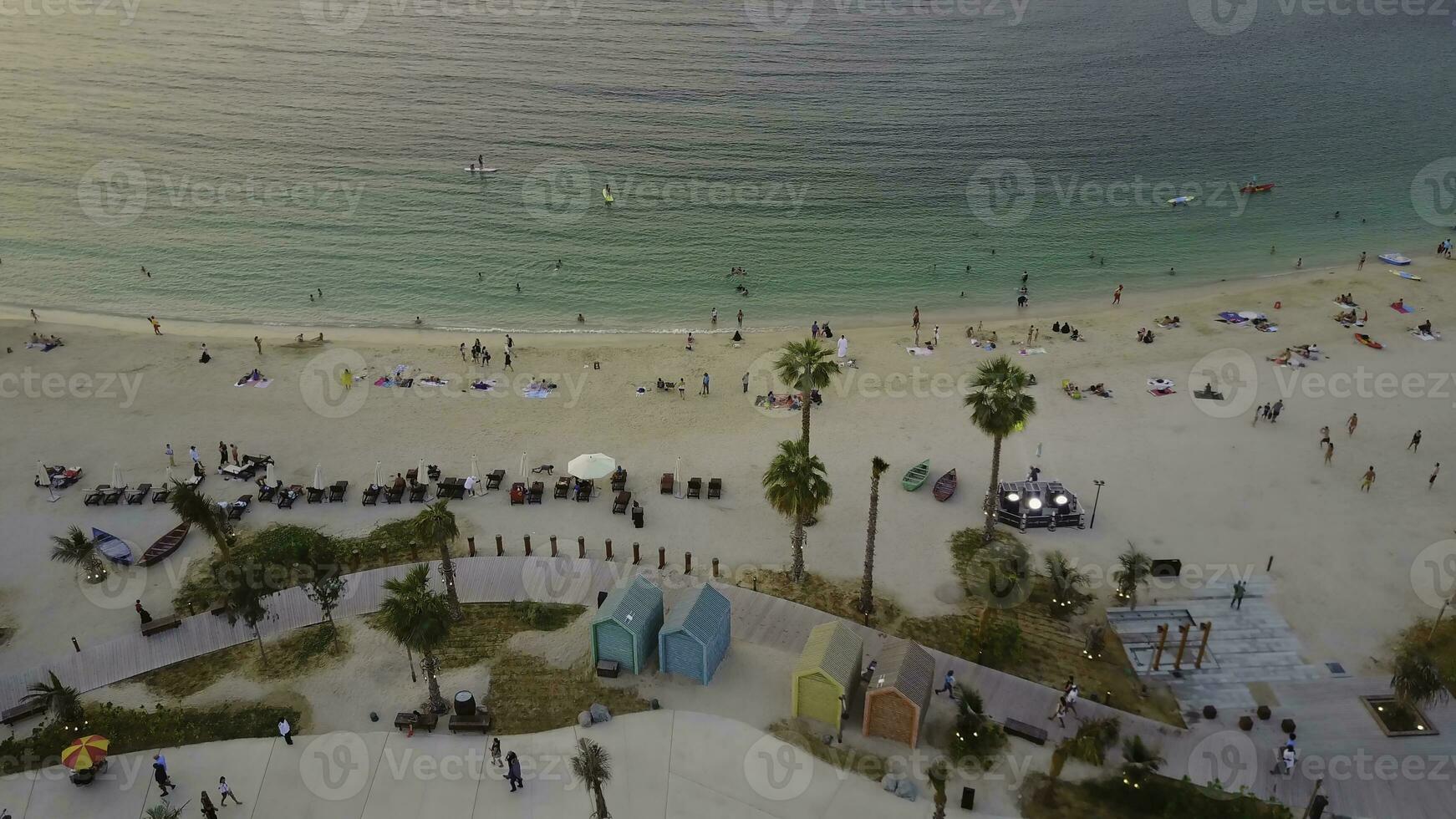 The green oasis. The view from the top of the beach and Arabian Gulf. Top view of beautiful beach coast in Dubai photo