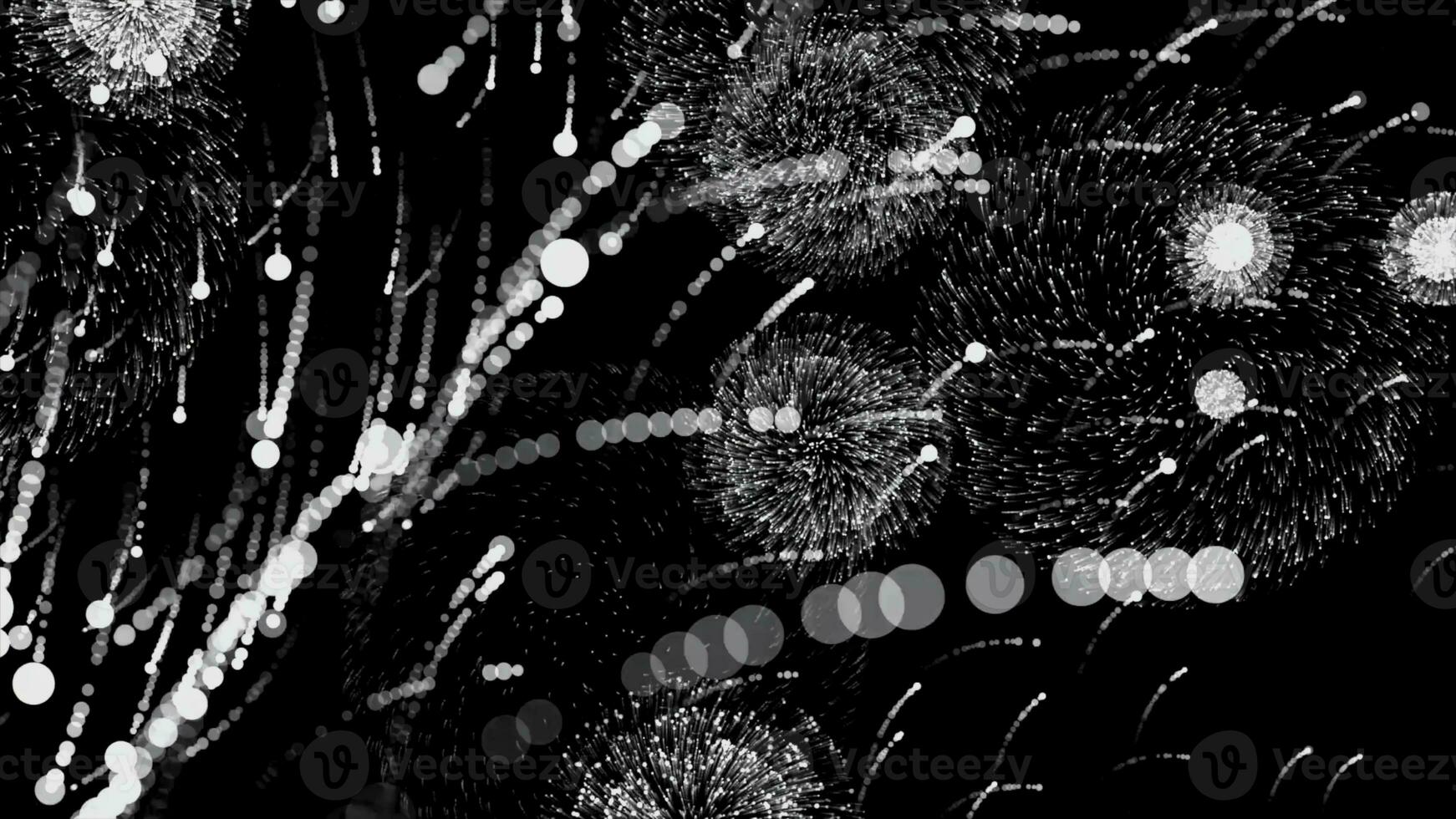 Amazing abstract animation of bright neon patterns from particles exploding on black background. Animation. Abstract blasts of digital neon fireworks photo