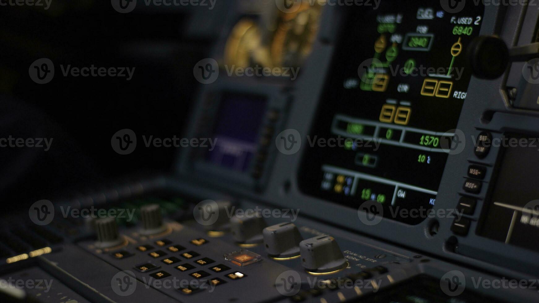 Autopilot control element of an airliner. Panel of switches on an aircraft flight deck. Thrust levers of a twin engined airliner. Pilot controls the aircraft. Onboard computer, cockpit photo