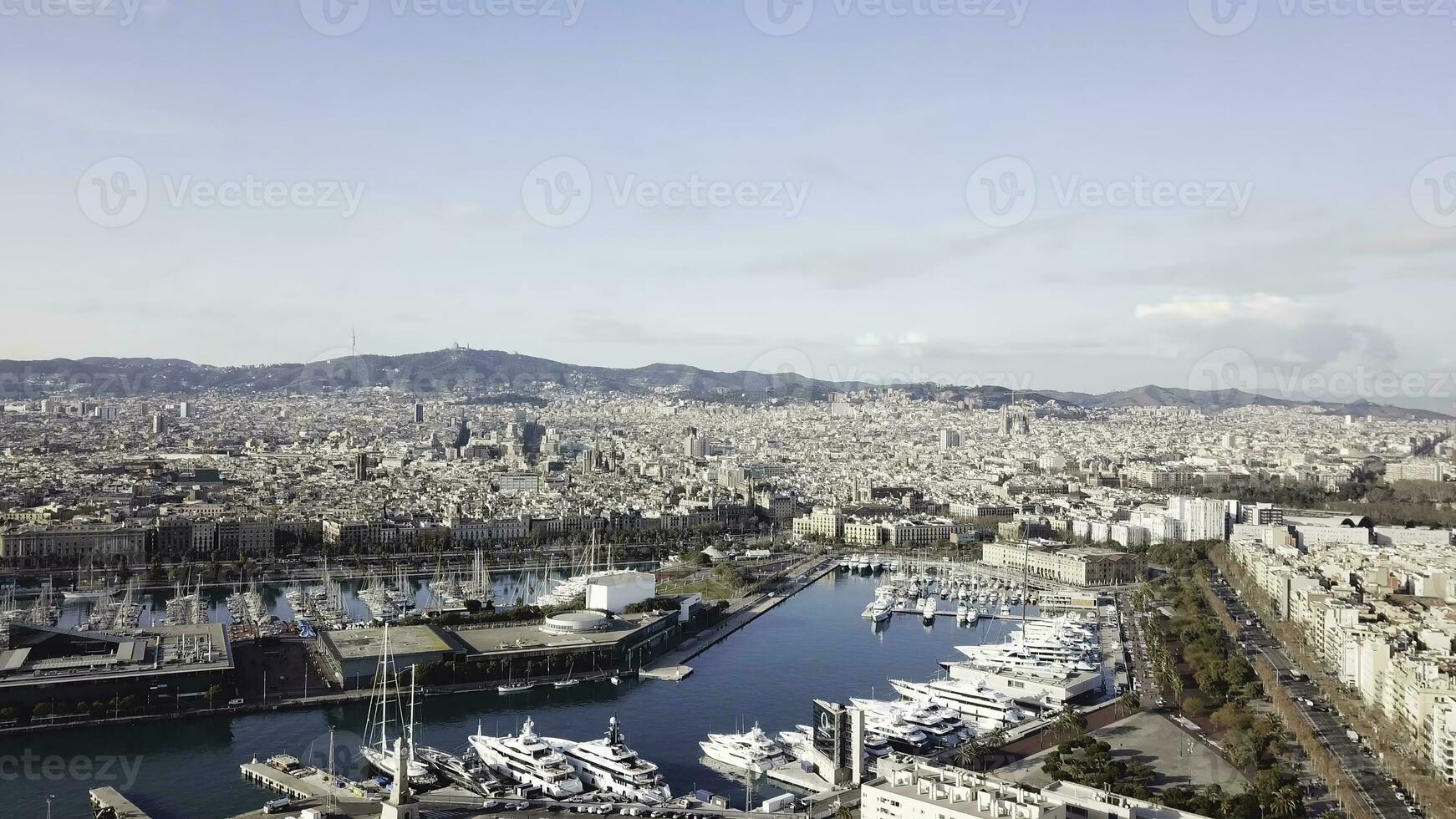 Aerial view of amazing boats at sunset. Stock. Top view from drone of harbor with yacht, motorboat and sailboat. Beautiful port photo