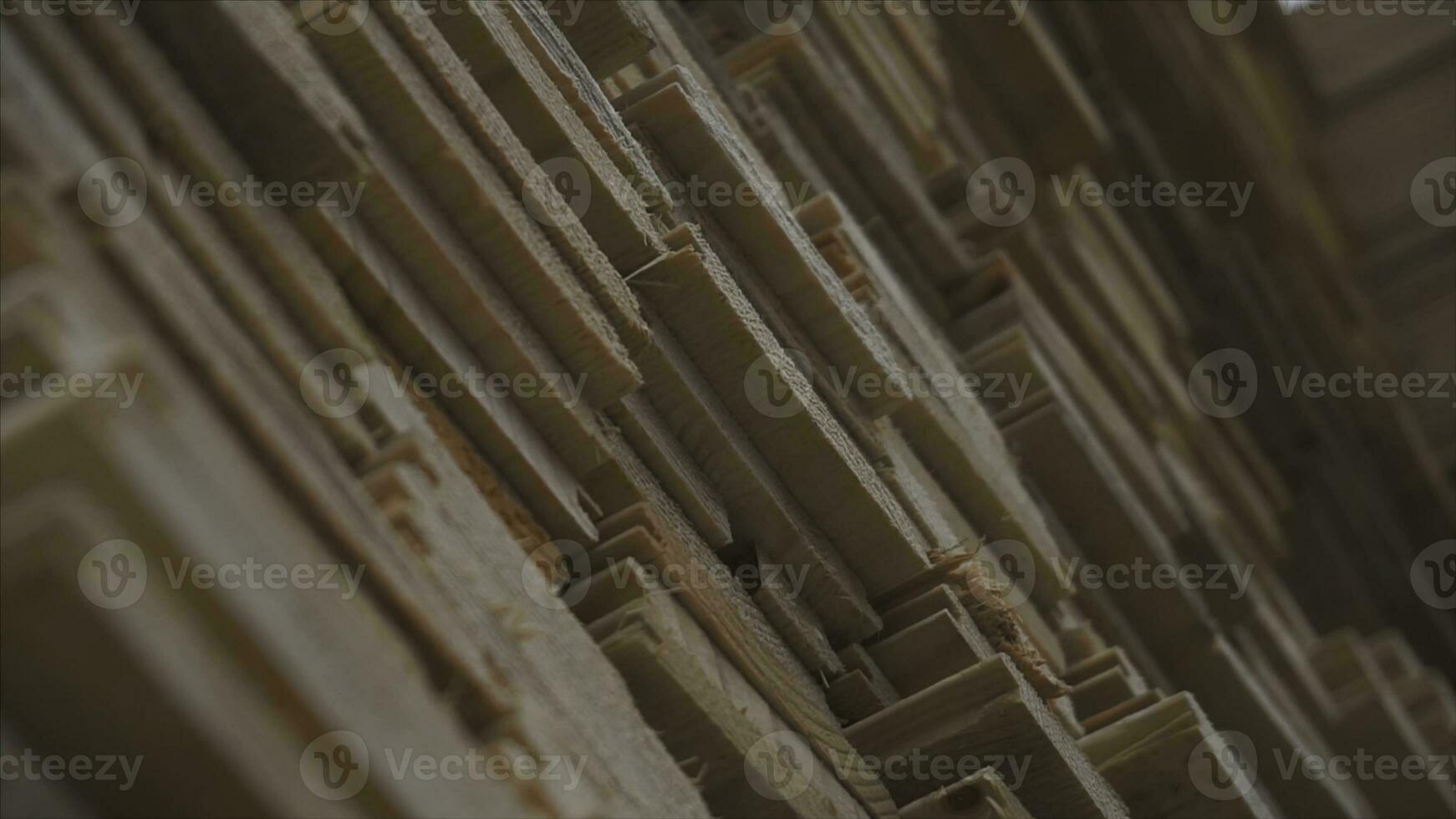 Background of the square ends of the wooden bars. Wood timber construction material for background and texture. close up. Stack of wooden bars. small depth of field. plywood boards on the furniture photo