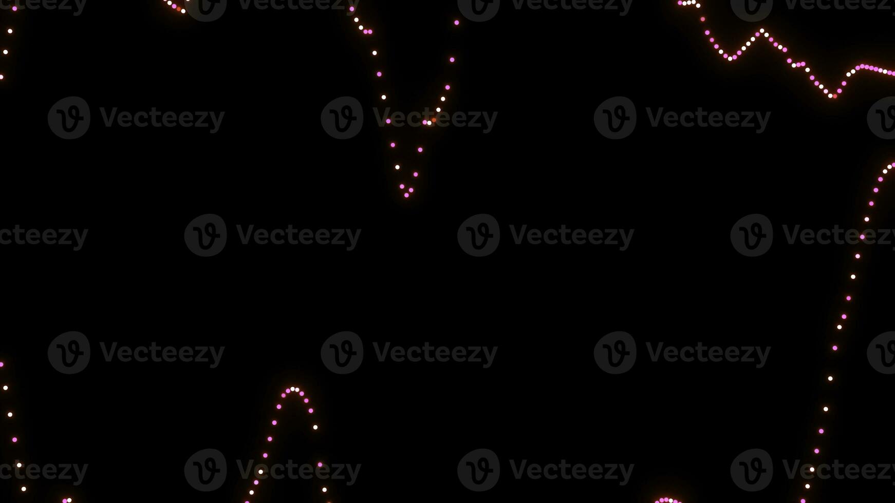 Black background. Design. Pink swaying beads in animation that scatter in different directions. photo