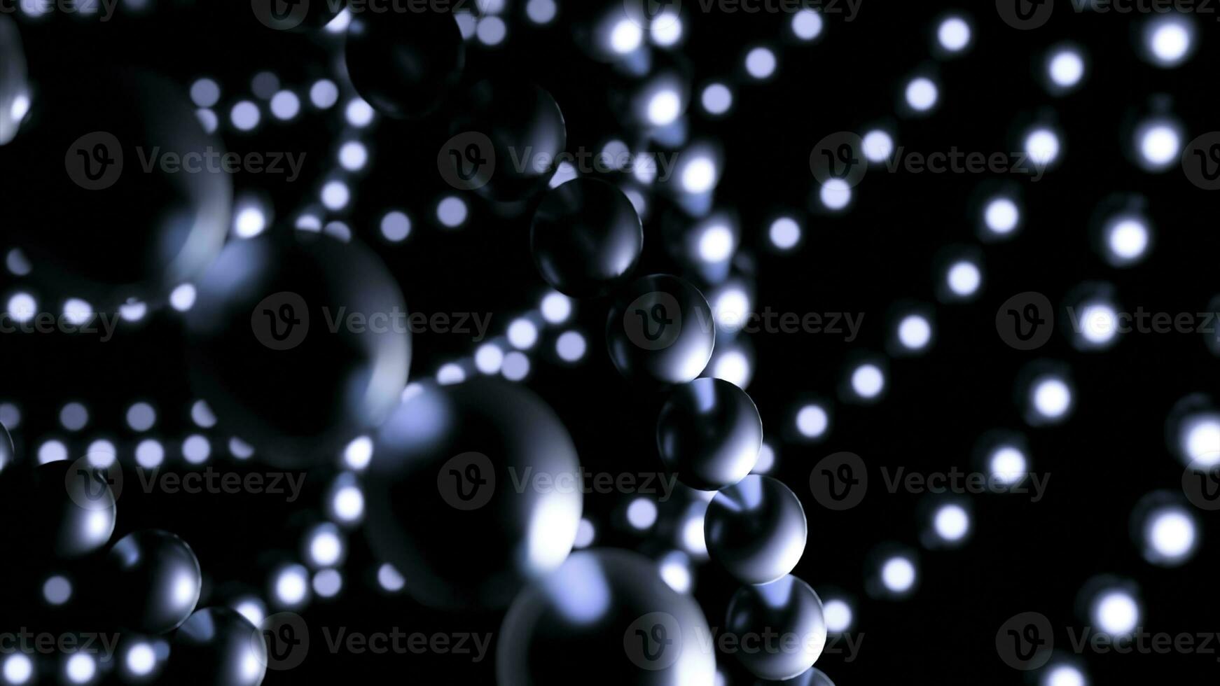Balls move in lines in space. Design. Chains of balls move in space on black background. Metal balls move in lines in web photo