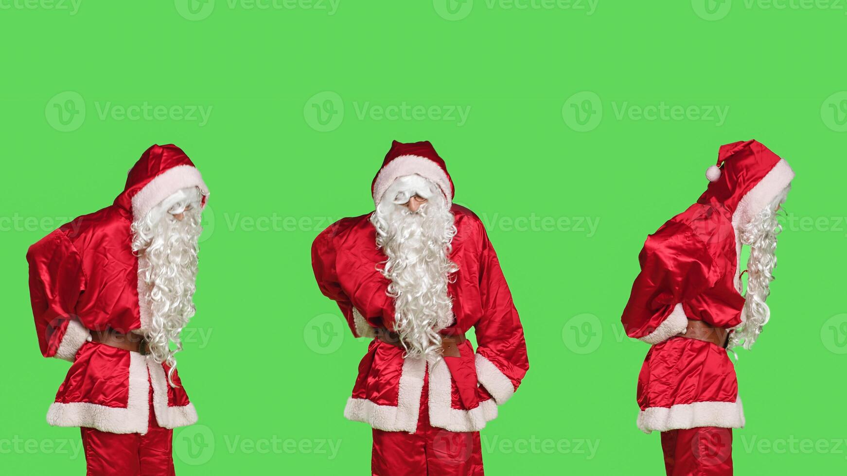 Unwell santa claus having back pain while he is wearing iconic red costume with hat, feeling sick on holidays. Father christmas dealing with spinal ache from giving presents to children. photo