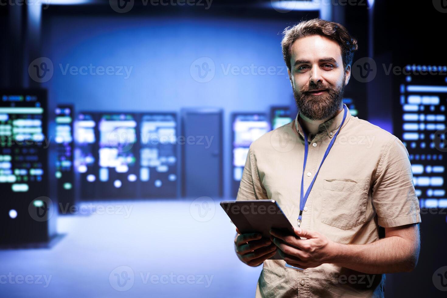 Portrait of technician making sure servers in cloud computing business service are correctly equipped, to provide redundancy and automatic failover of clusters to minimize failure of hardware photo