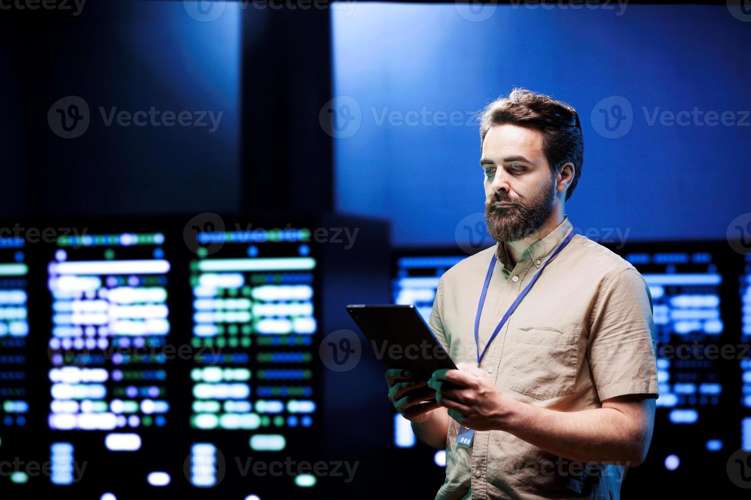 Admin walking in data center supporting AI through powerful computing operations, hosting specialized storage servers. Engineer ensuring high tech facility internal hardware functions properly photo