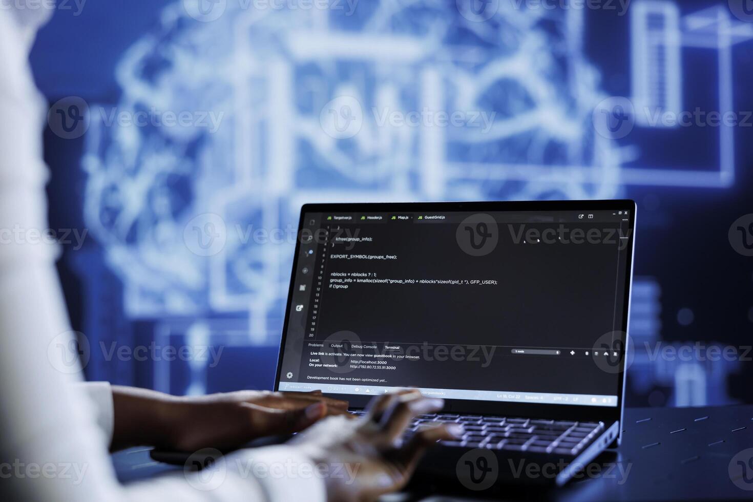 Qualified technician updates neural networks made up of interconnected nodes, writing intricate binary code scripts on laptop. Skilled expert uses programming to upgrade AI simulation model photo