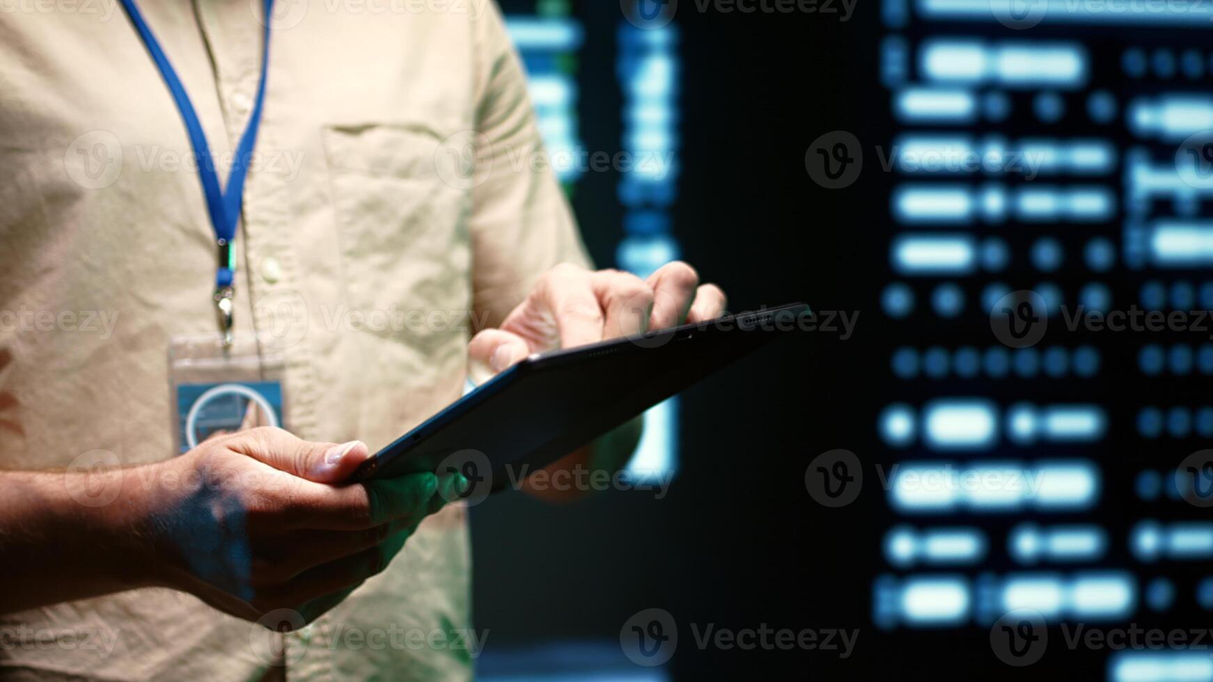 IT Specialist walking through operational server rows in computer network security data center. Mainframes providing processing and memory resources for various workloads, close up photo