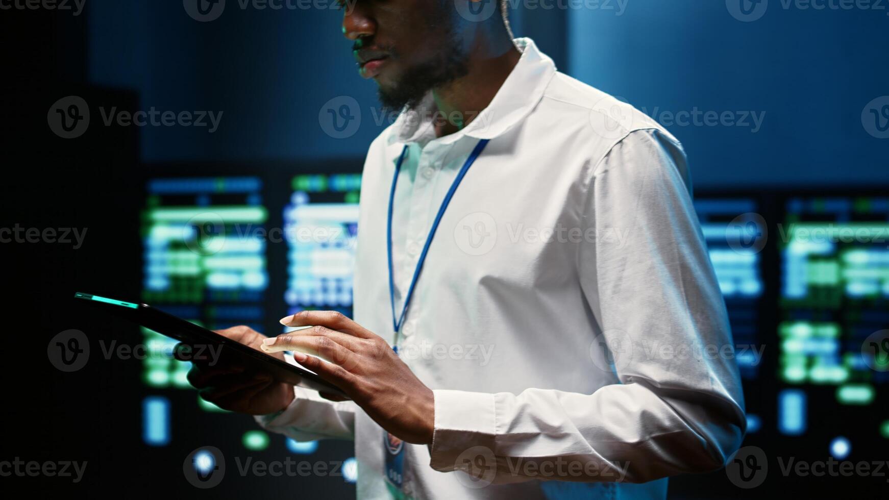 Precise engineer checking blade servers performing data backups and providing centralized storage. Technician maintenancing electric generators ensuring operational continuity, close up photo