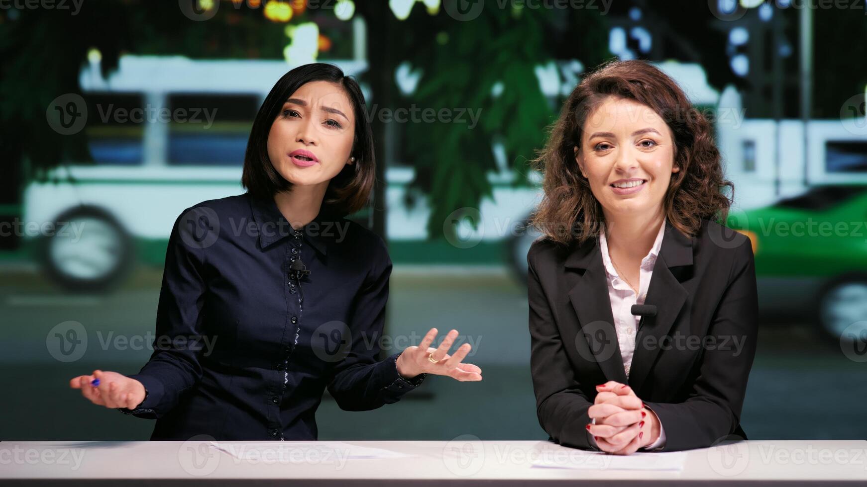 Journalists team opening talk show at night in studio, presenting breaking news or latest scandals in daily newscast live on tv network. Media presenters addressing topics in entertainment panel. photo