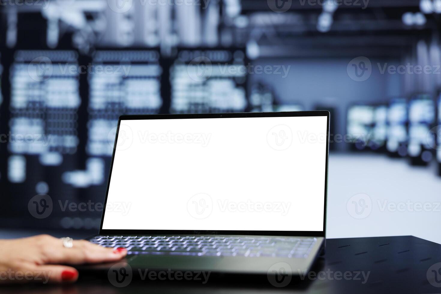 Close up shot of mock up laptop used by expert in server farm delivering massive computing power, capable of processing and storing vast amounts of data and controlling network resources photo