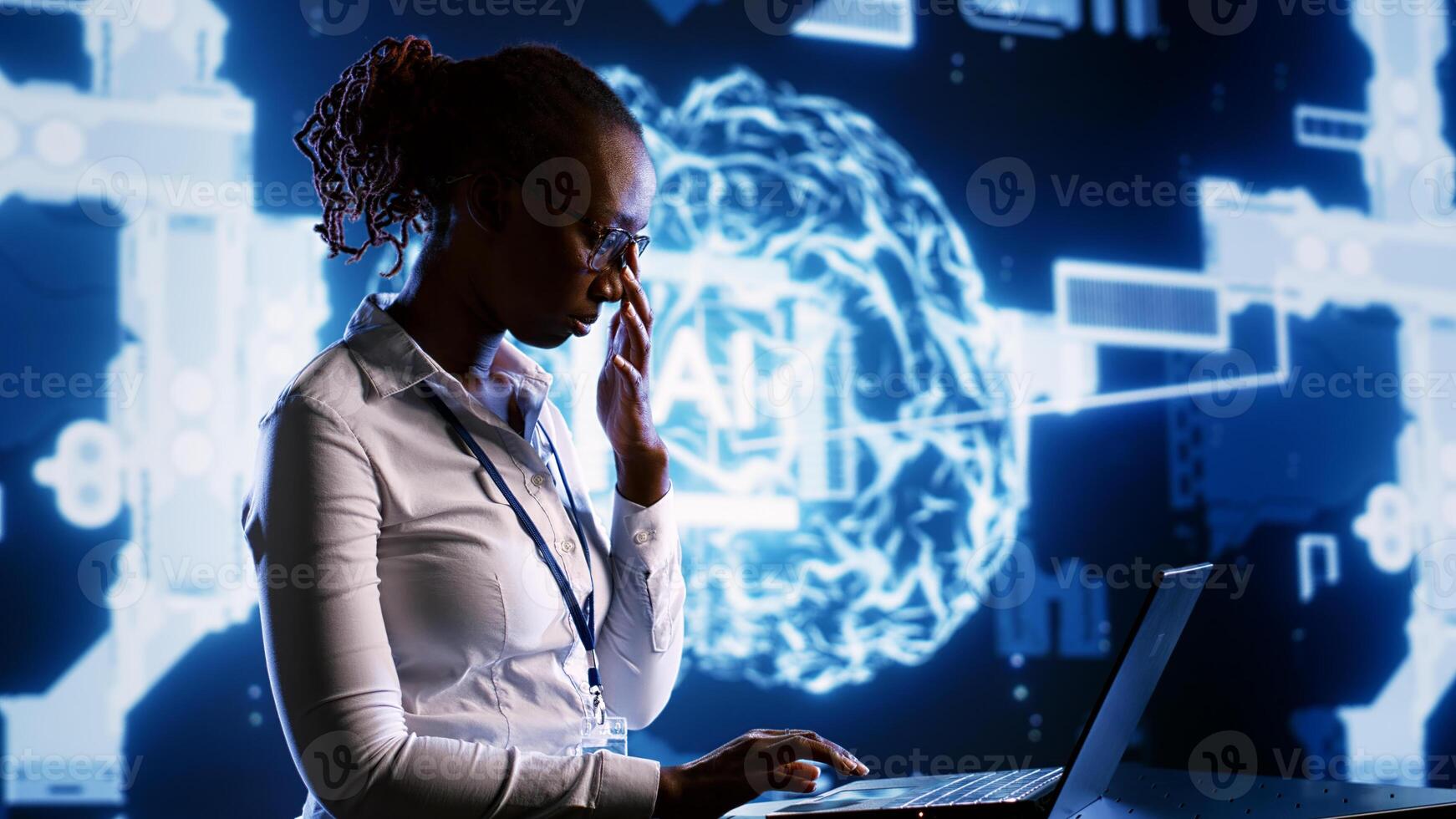 African american engineer develops artificial intelligence neural networks architecture inspired by human brain. Woman with IT expertise setting up AI machine learning algorithms in high tech startup photo