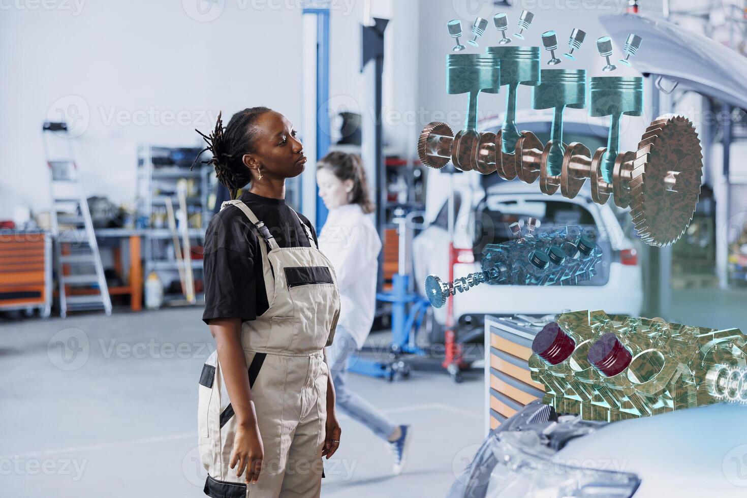 Experienced worker in repair shop using holographic augmented reality to visualize car mechanical parts in order to fix them. Technician using AR technology while working on defective vehicle radiator photo