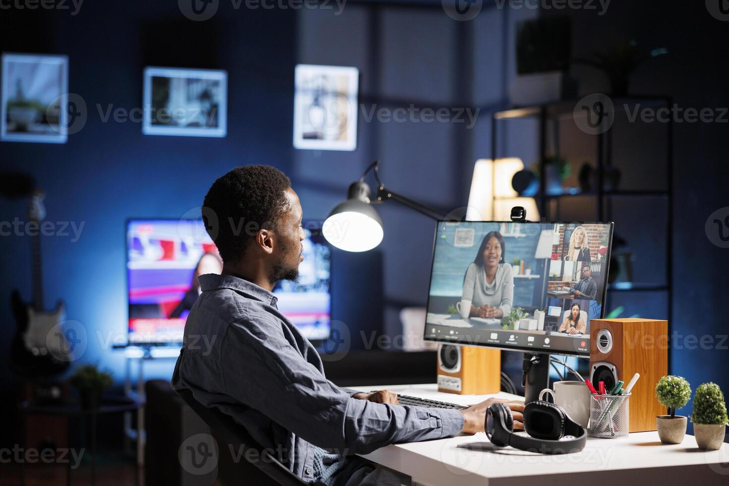 Team member interacting with partners via videoconferencing system, addressing recent business duties and procedures to be handled. Young person on internet videocall, working remotely at home. photo