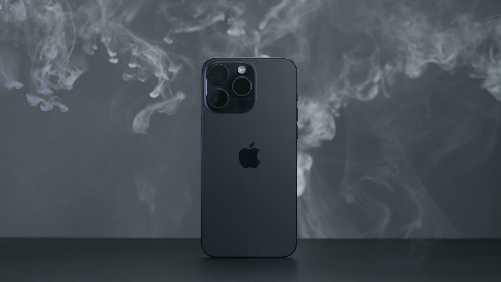 USA, New York - September 15, 2023. New iPhone 15 pro on isolated background. Action. Stylish design of new iPhone 15 pro max on isolated ofn. Promotional minimalistic video with new iPhone model 15 photo