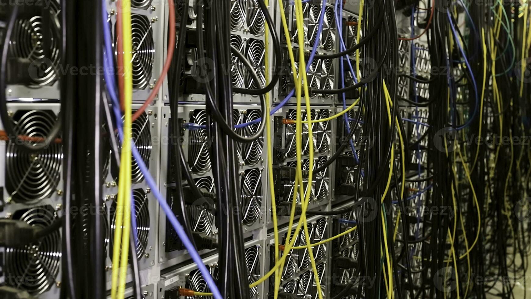 Fiber optic equipment in a data center, IT and modern technologies concept. Stock footage. Server room routers and fiber optical cables. photo