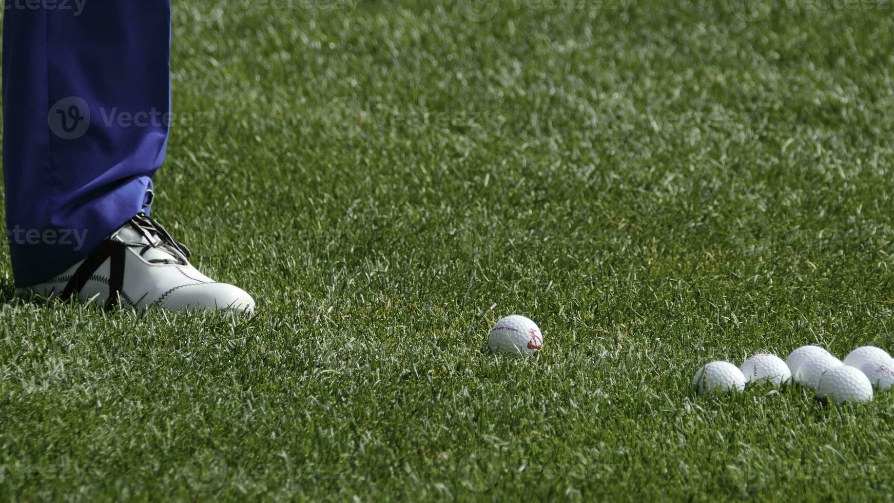 Golfer Hitting Golf Shot with Club on the Course. Hit the ball Golf photo