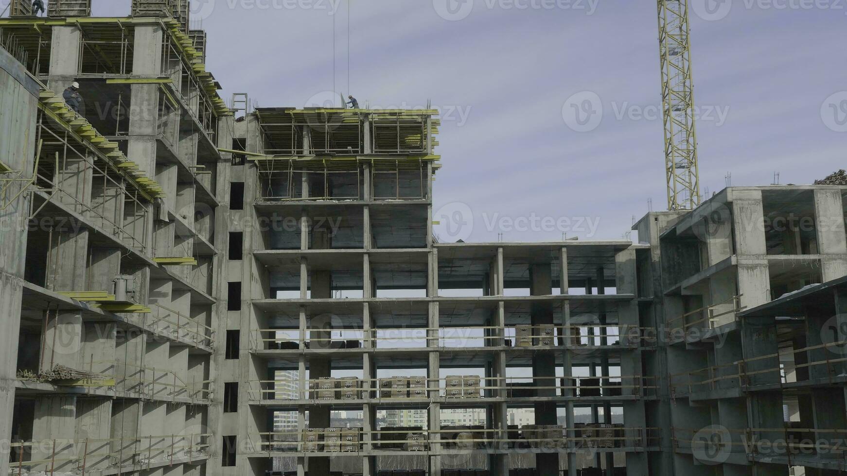 Apartments construction site with crane. Crane and building construction photo