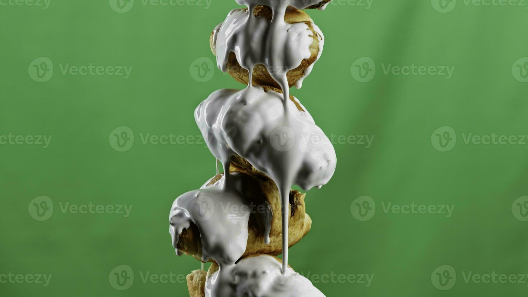 Dessert kitchen concept on a green background. Stock clip. Oranges and sweet butter cookies doused with white sweet custard. photo