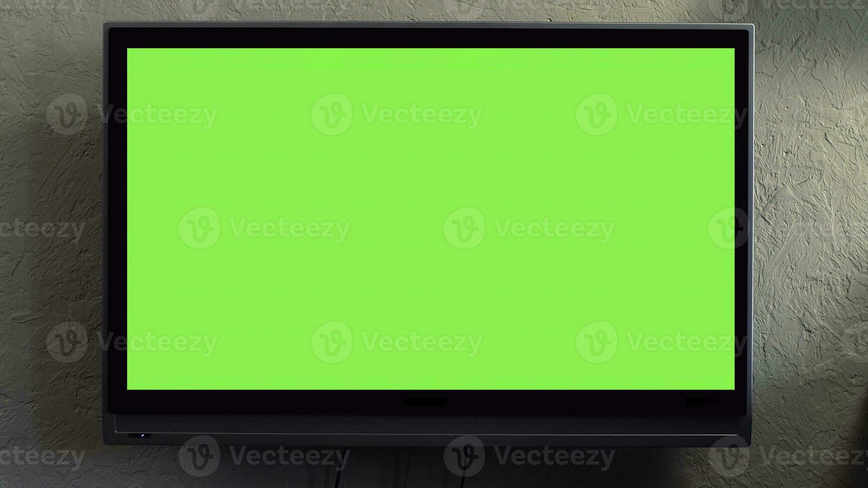 Flat screen TV with green screen composited. TV or television - green screen - room - on the wall. LCD TV with track green screen in modern livingroom photo