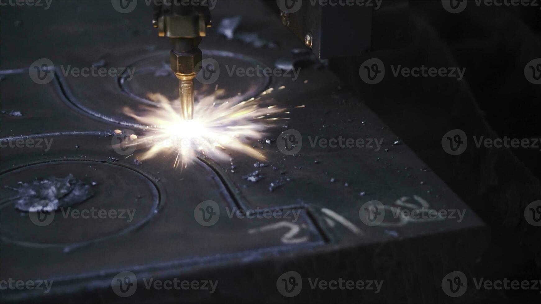 Close-up of metal pattern welding machine. Clip. Automated welding machine creates beautiful patterns on metal in factory. Factory welding patterns on metal photo