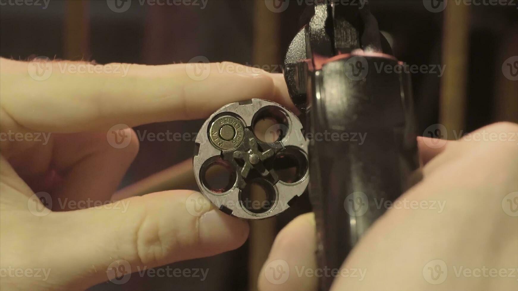 Male hand reload a revolver. Magnum gun without bullets , Magnum revolver and empty bullet, Magnum. lead round nose. 45 auto rim revolver rounds. photo