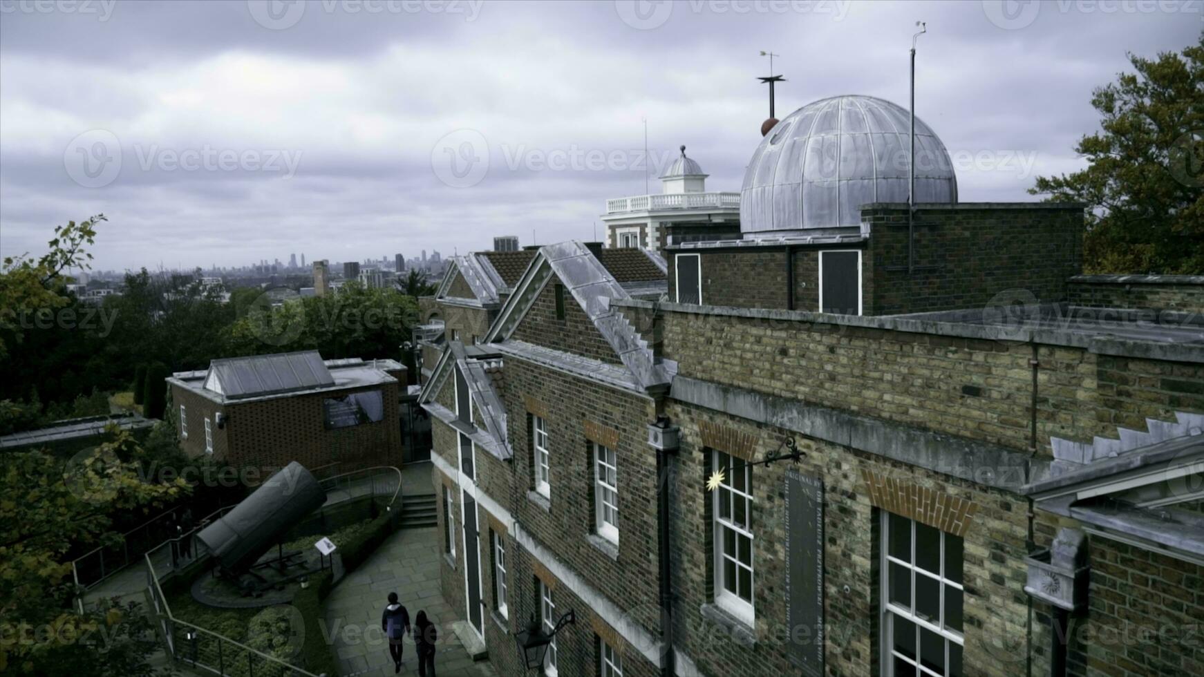 Old houses with European architecture in city. Action. European houses with ancient architecture of dark brick. Old architecture of houses of European cities attracts tourists photo
