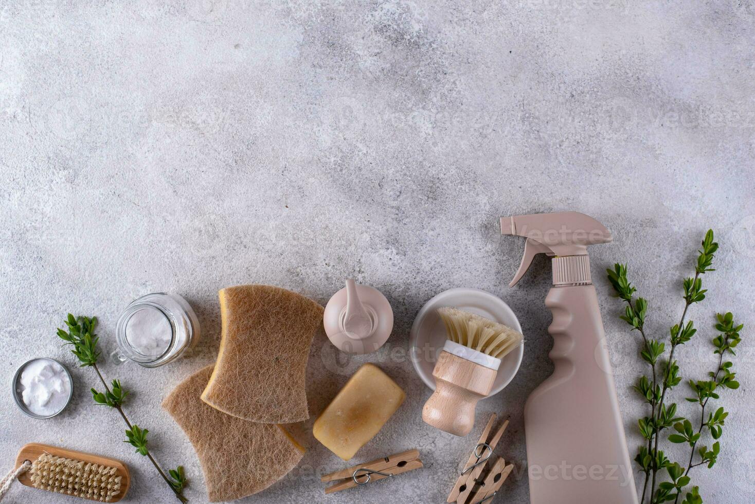 Eco cleaning with bottles, brushes and sponges photo