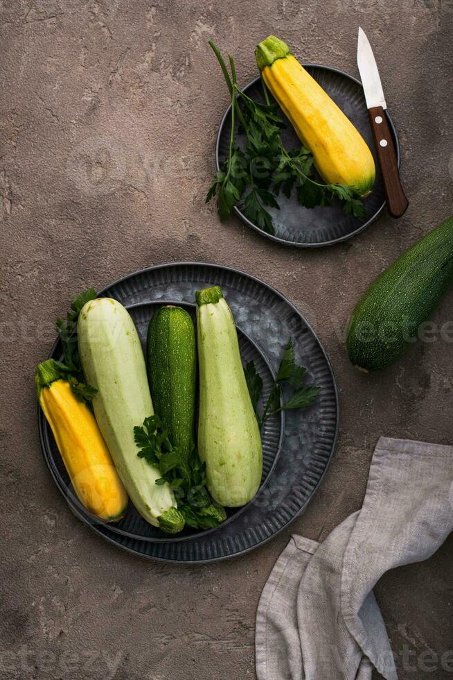 Assortment of different color of zucchini photo