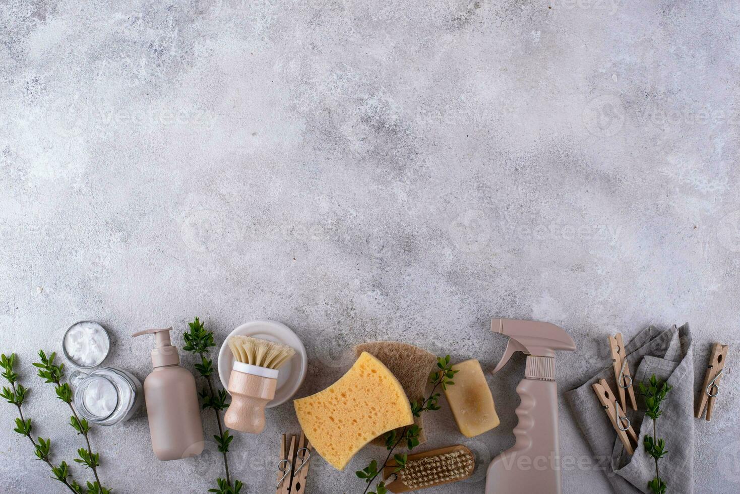 Eco cleaning with bottles, brushes and sponges photo