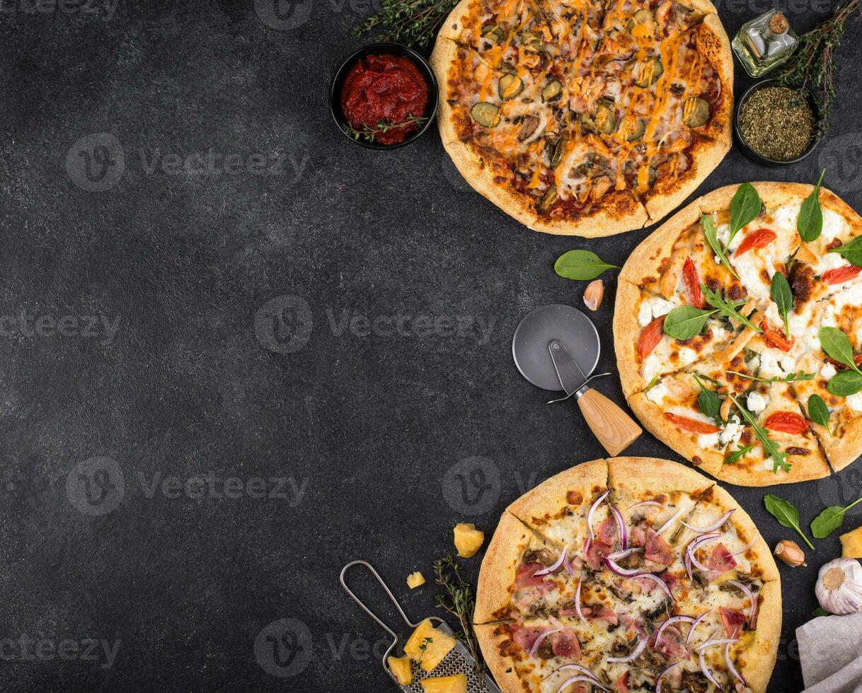 Assortment of various type of Italian pizza photo