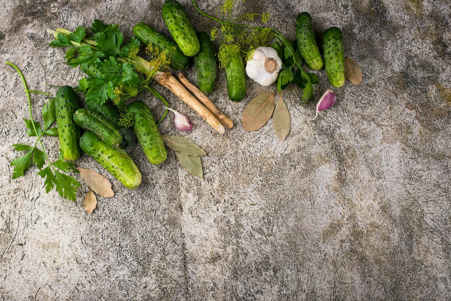Ingredients for pickled or marinated cucumber photo