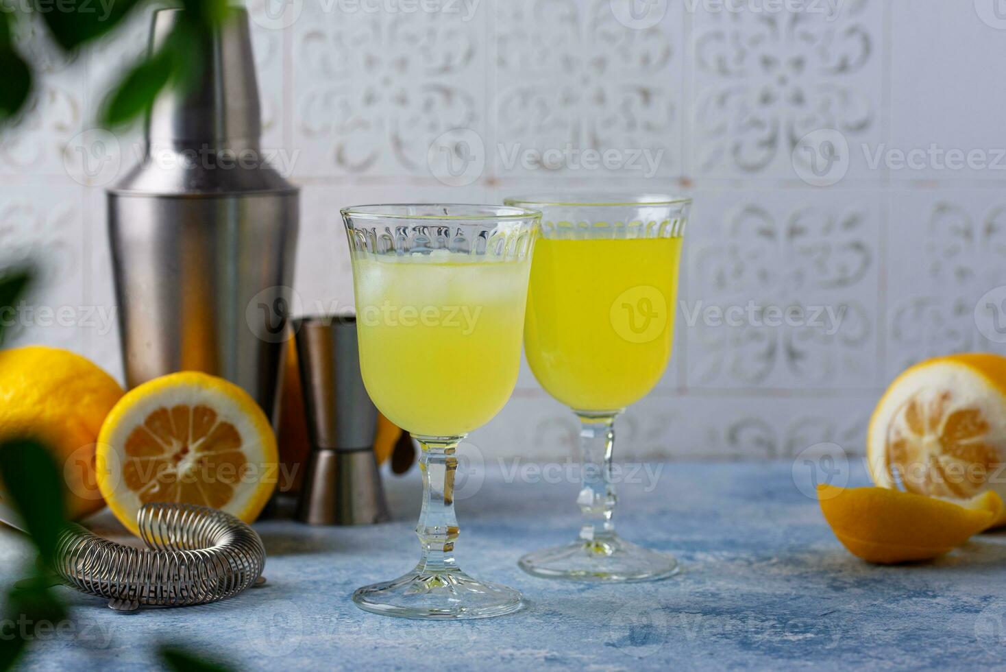 Traditional italian limoncello or lemon liquor photo