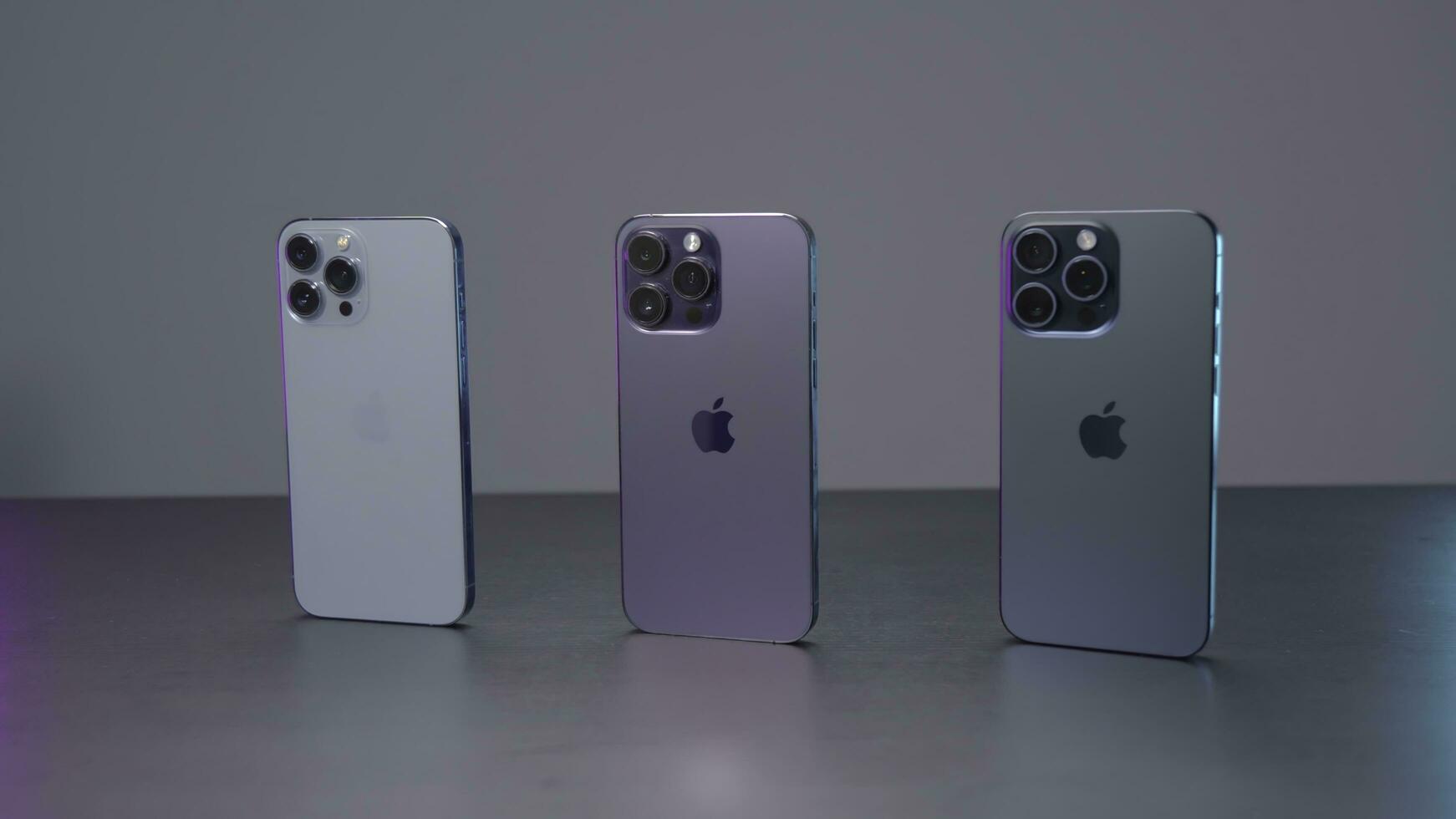 New York - September 15, 2023. Comparison of design of new iPhone models. Action. New model of iPhone 15 pro max in comparison with version of 14th and 13th generations. Comparison of design of new photo