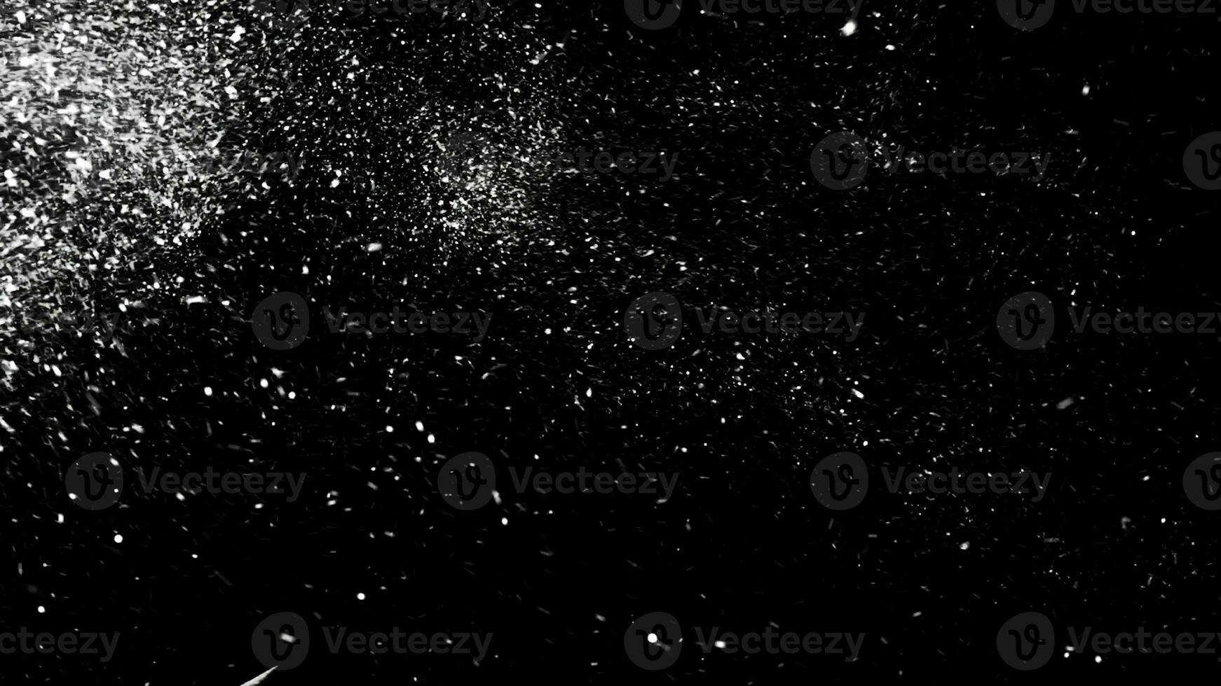 Abstract white dust particles floating on black background, monochrome. Animation. White dynamic motion of abstract snow. photo