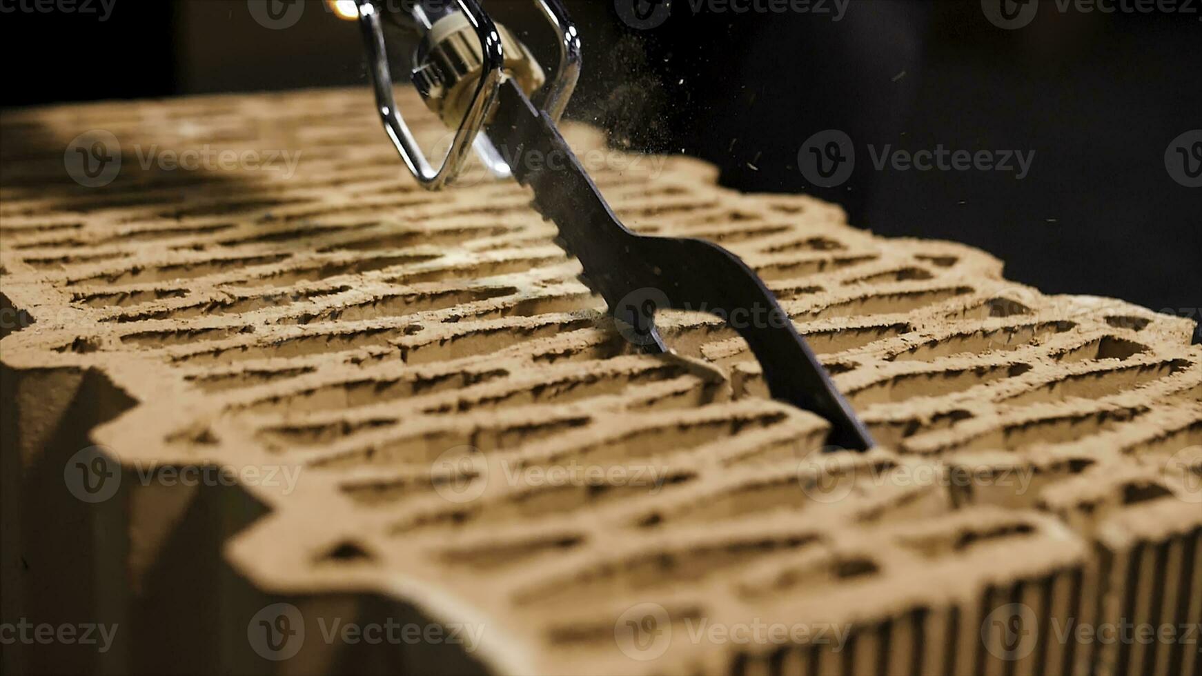 Close up of a worker using a block cutting automatic saw to prepare ceramic blocks for building process. Stock footage. Turned on small electric saw. photo