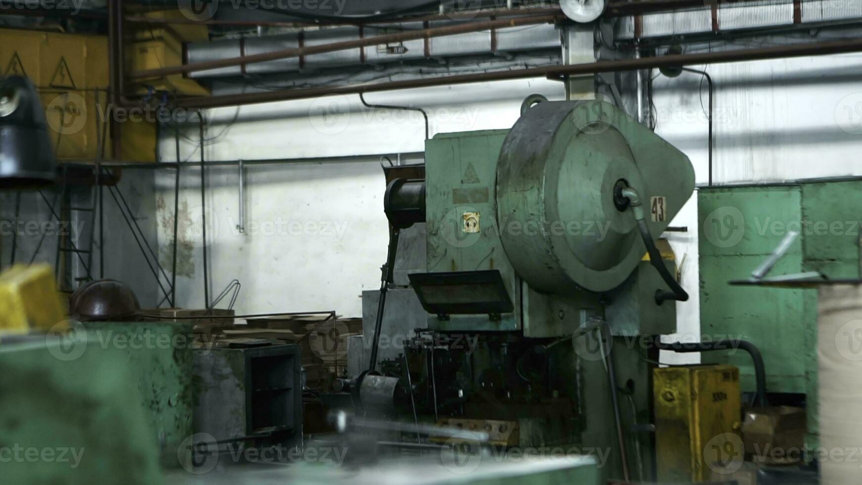 Close-up of old industrial machines in abandoned workplace. Industrial workshop. photo