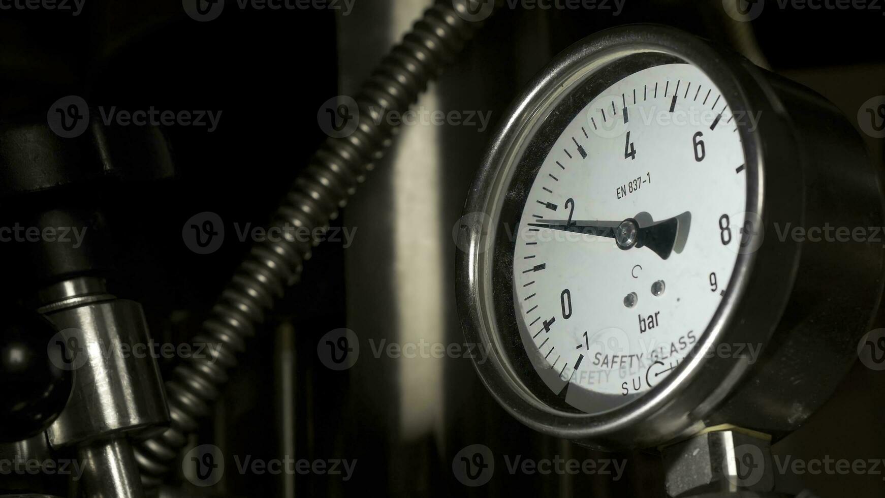 Gauge pressure in the pipeline. Pressure gauge, manometer closeup photo