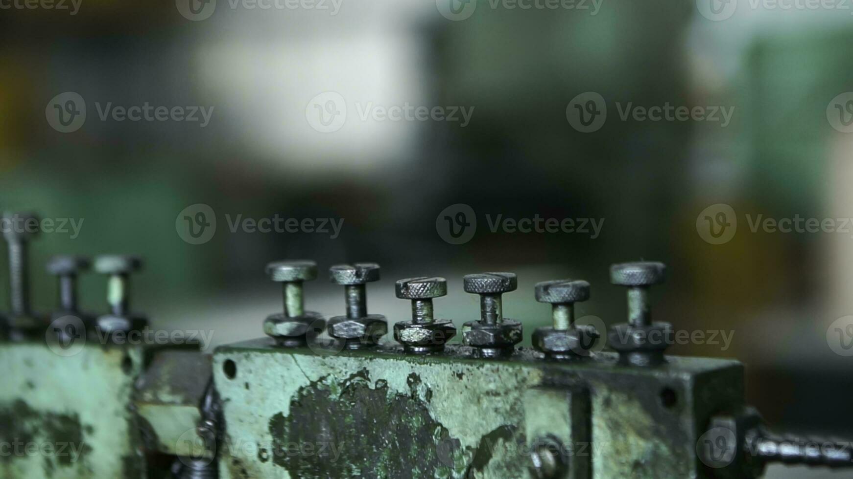 Close-up of old industrial machines in abandoned workplace. Industrial workshop. photo